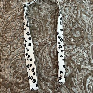 White Strap with Black Paw Prints Adjustable with Hooks on Each End